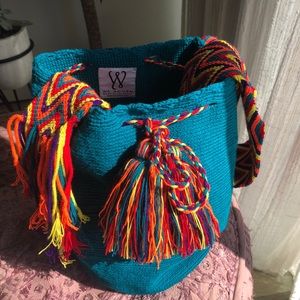 Mochila-bright, turquoise green w/multiple accent